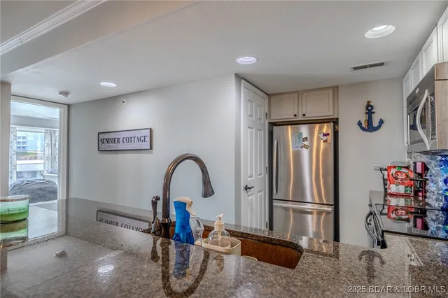 $349,000 | 442 Regatta Bay Drive, Unit 1B, Lake Ozark, MO 65049