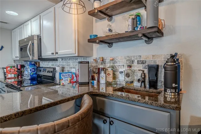 $349,000 | 442 Regatta Bay Drive, Unit 1B, Lake Ozark, MO 65049