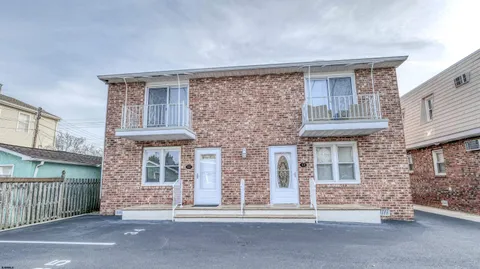 a view of a house with a balcony