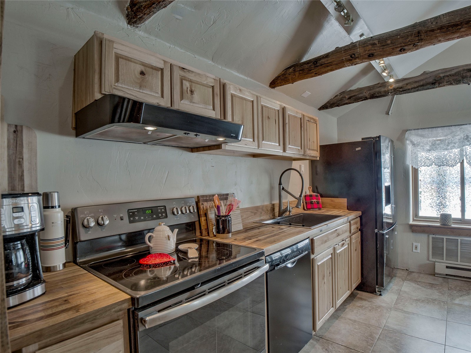 46 Singleton Road Alma, CO 80420 - Photo 13 of 50 a kitchen with stainless steel appliances granite countertop a sink stove and cabinets