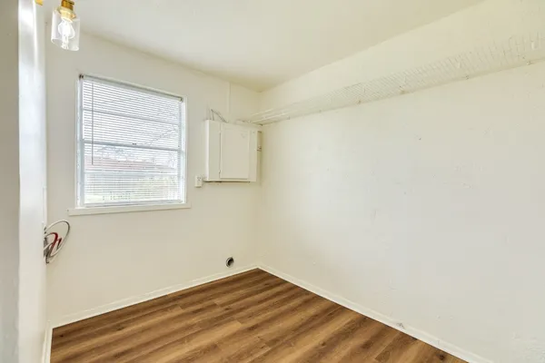 a view of a room that has a window in it