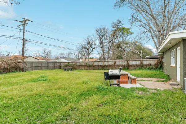 a view of a garden with a bench