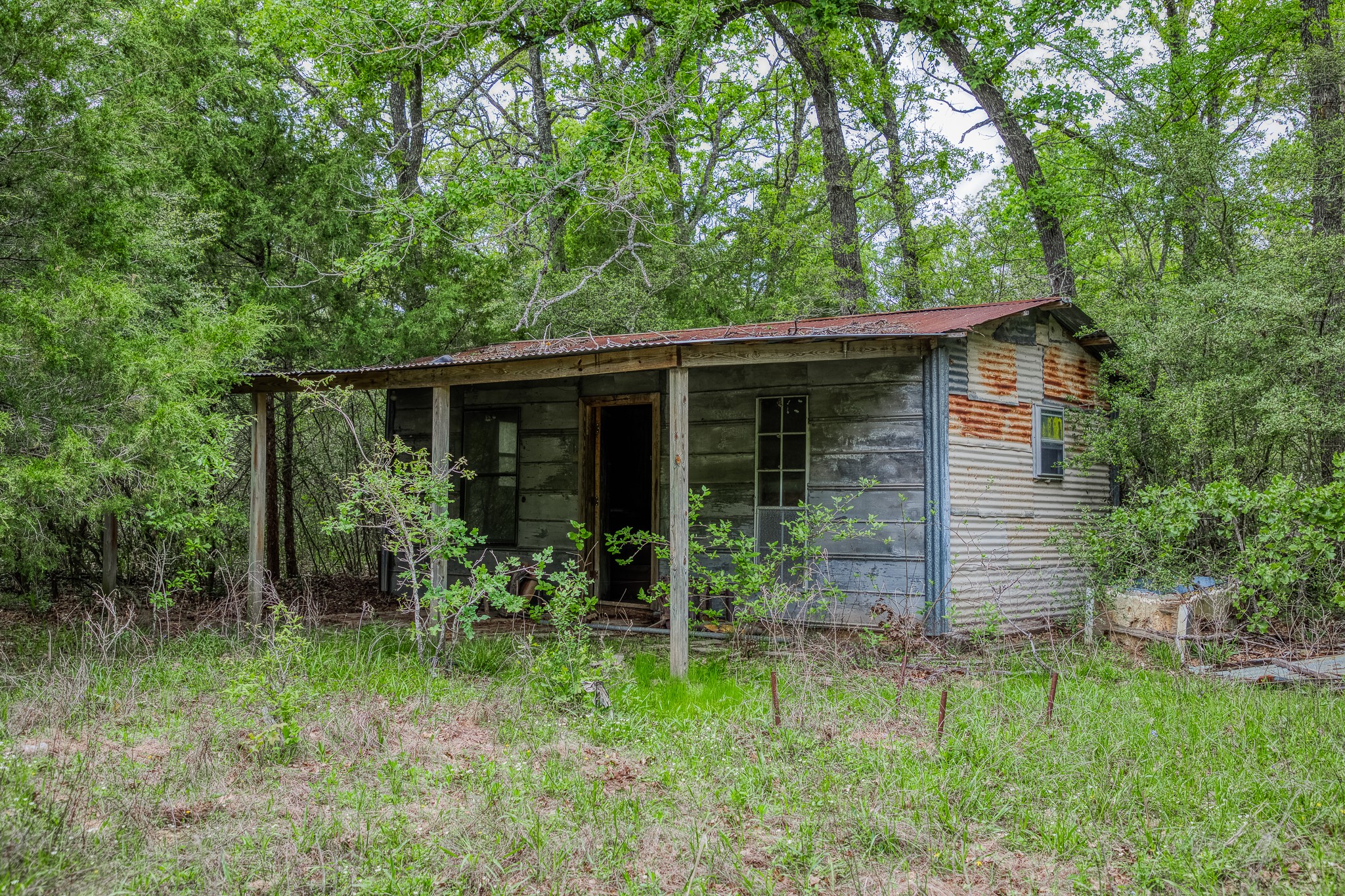 125 Ledbetter Tx 78946 Ledbetter, TX 78946 - Photo 19 of 50 a view of house with a yard and potted plants