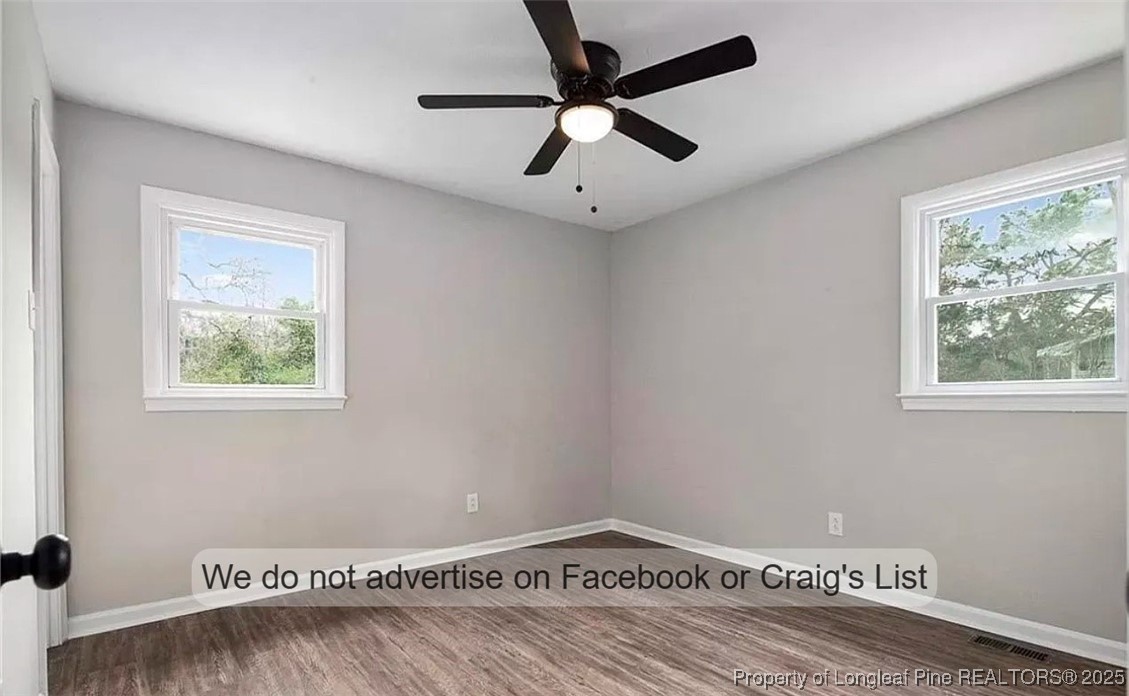 1604 Shaw Road Fayetteville, NC 28311 - Photo 3 of 12 a view of an empty room with a window