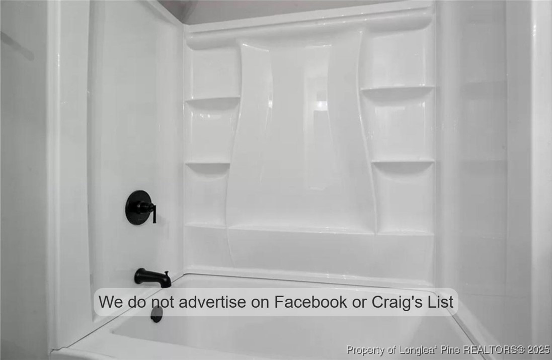 1604 Shaw Road Fayetteville, NC 28311 - Photo 8 of 12 a bathroom with a shower