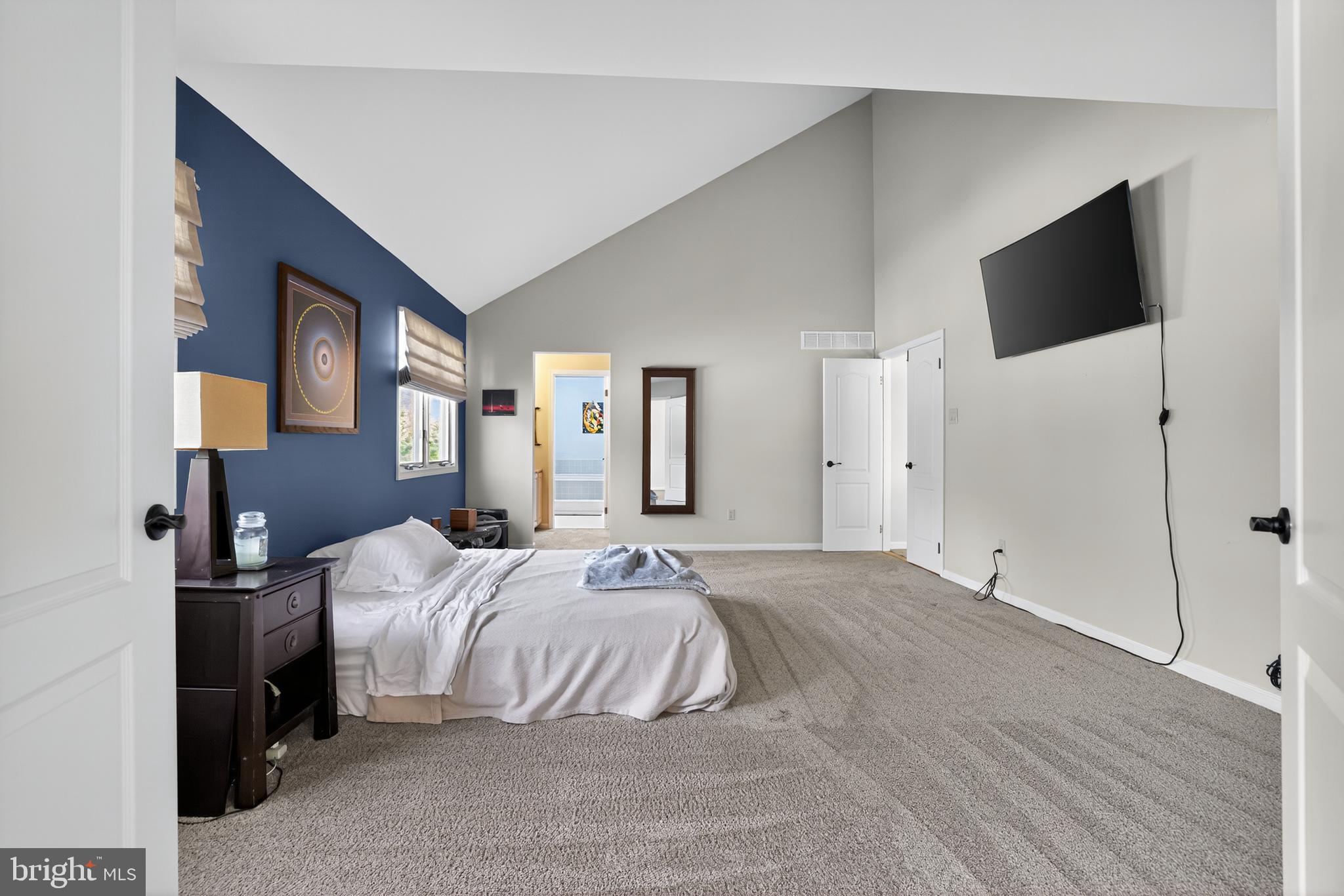 301 Windy Run Road Doylestown, PA 18901 - Photo 25 of 51 a bedroom with a bed and a flat screen tv