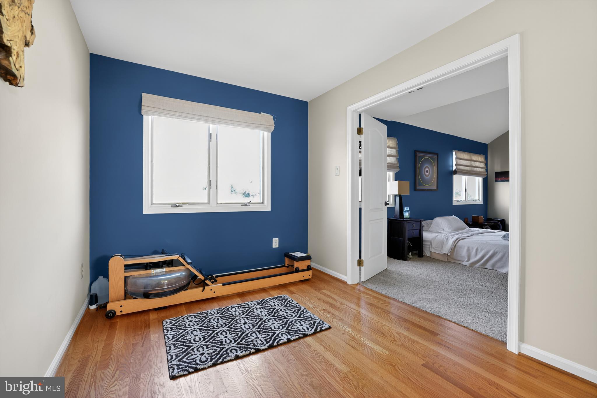 301 Windy Run Road Doylestown, PA 18901 - Photo 27 of 51 a bedroom with a bed and wooden floor