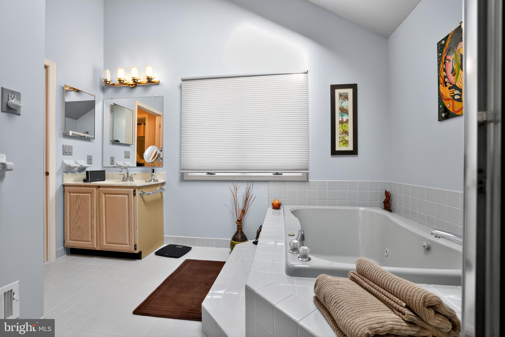 301 Windy Run Road Doylestown, PA 18901 - Photo 30 of 51 a bathroom with a tub sink and mirror