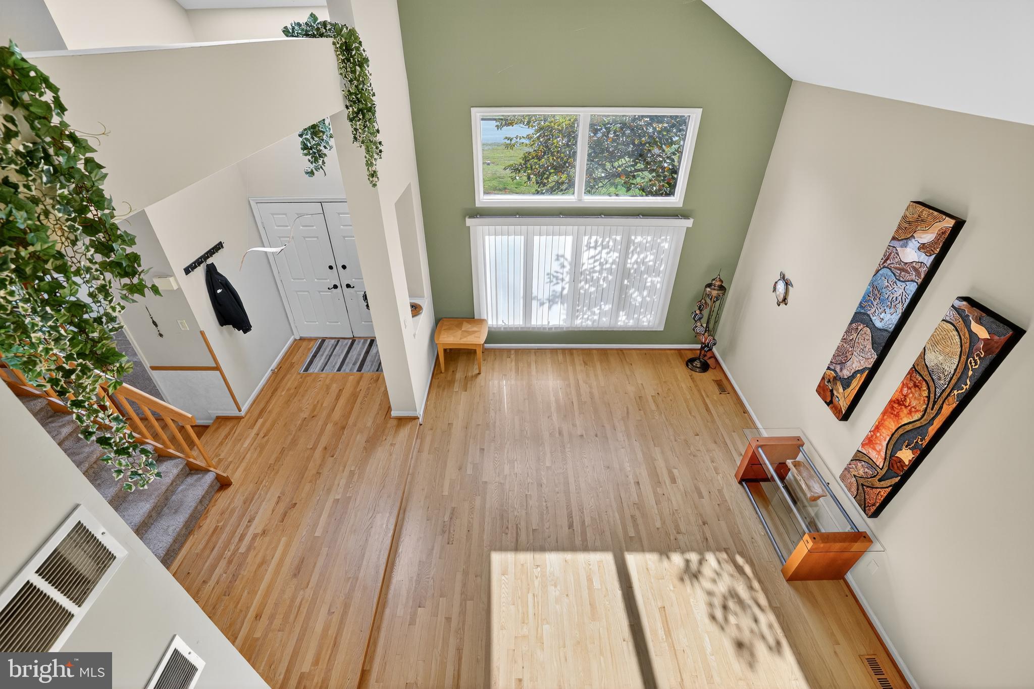 301 Windy Run Road Doylestown, PA 18901 - Photo 5 of 51 a view of an entryway with wooden floor and front door
