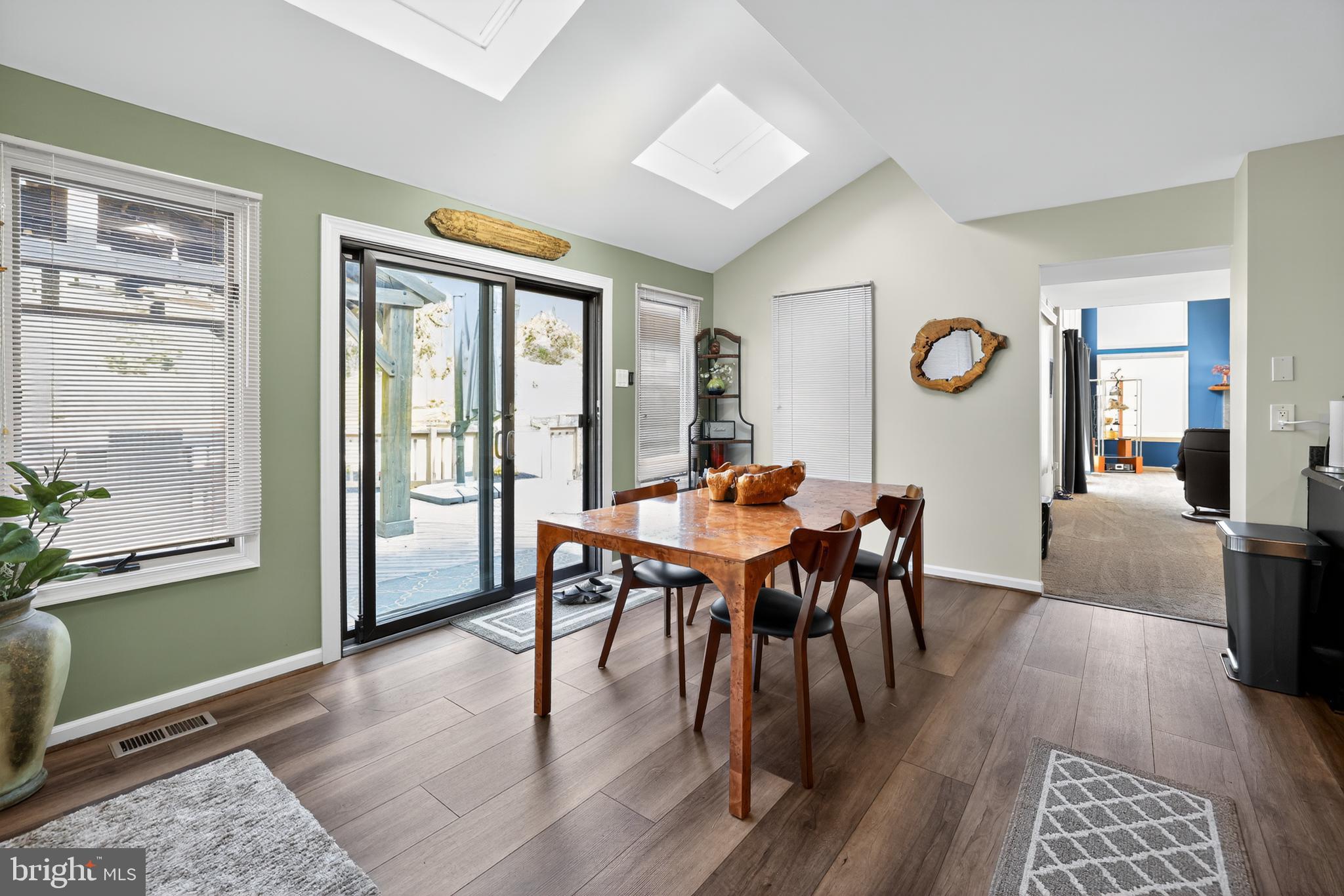 301 Windy Run Road Doylestown, PA 18901 - Photo 9 of 51 a view of a dining room with furniture window and wooden floor