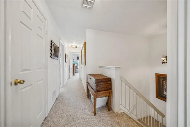 a view of hallway with stairs