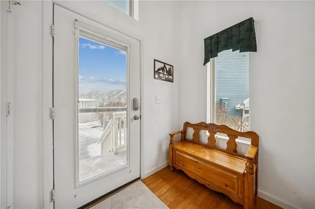 a living room with furniture and a walk in closet