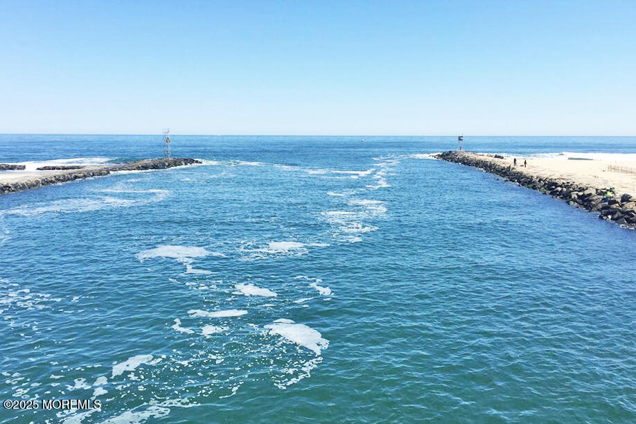 1000 River Road, Unit 2K Belmar, NJ 07719 - Photo 21 of 25 a view of an ocean and beach