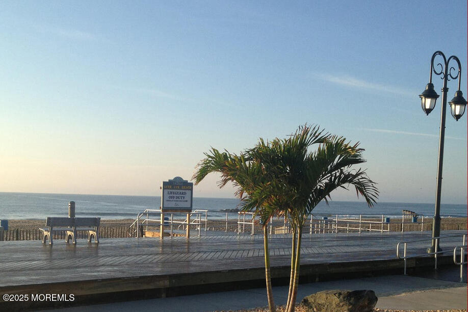 1000 River Road, Unit 2K Belmar, NJ 07719 - Photo 24 of 25 a view of house with outdoor space and seating area