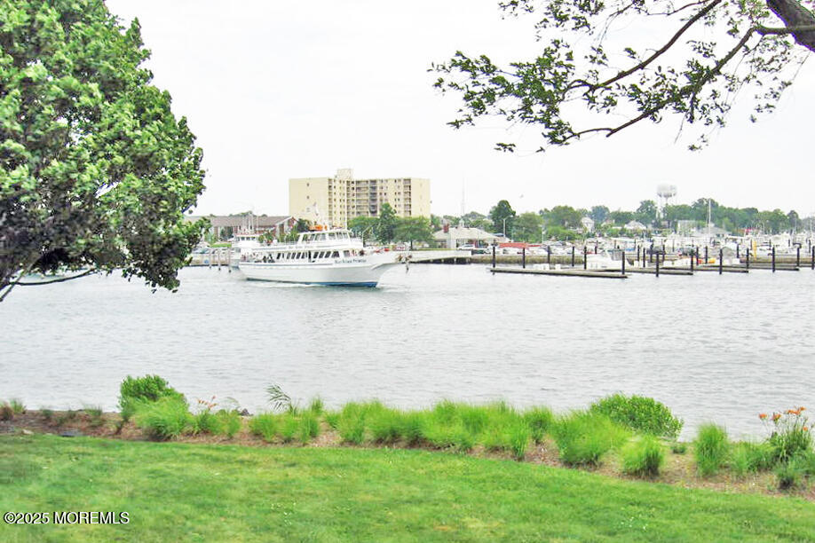 1000 River Road, Unit 2K Belmar, NJ 07719 - Photo 10 of 25 a view of a lake with a city view