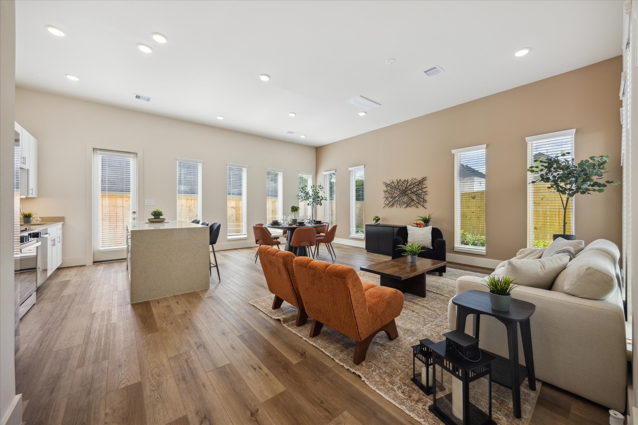 5903 Urban Pines Street Houston, TX 77091 - Photo 5 of 42 a living room with furniture and a wooden floor