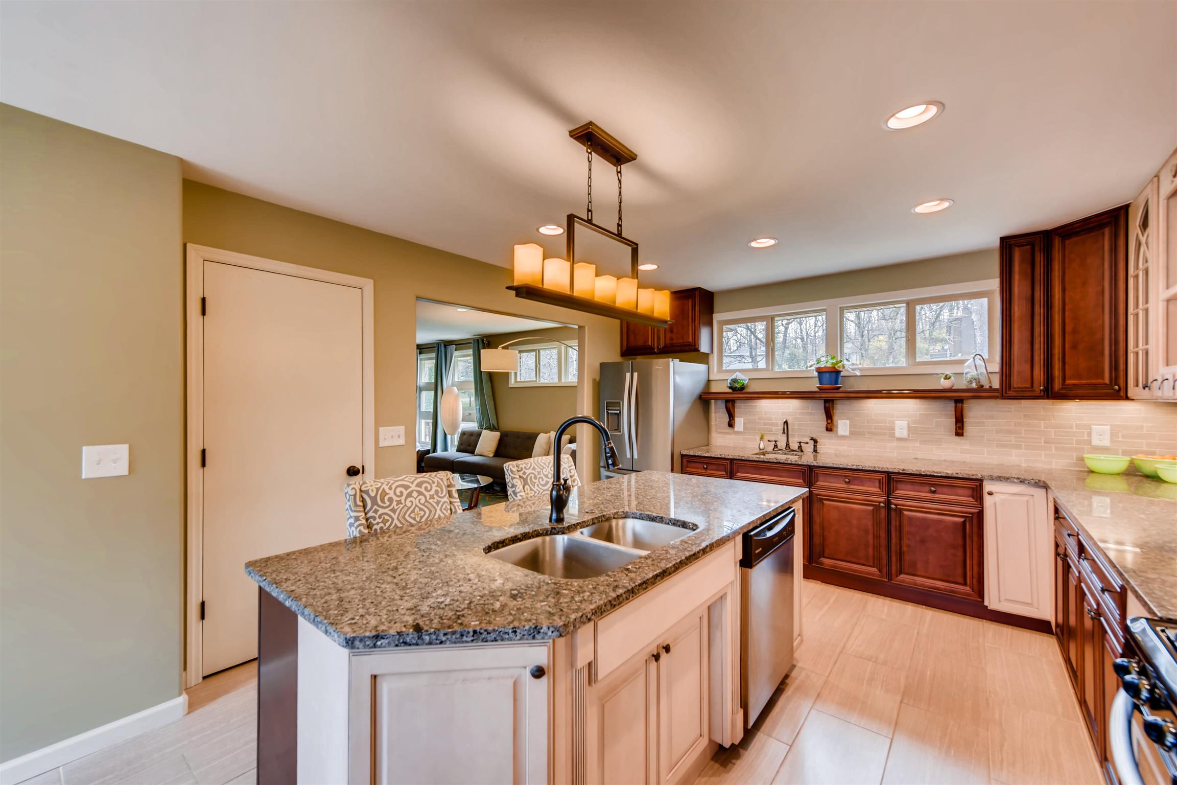 1100 Sparta Road Nashville, TN 37205 - Photo 15 of 29 a kitchen with granite countertop a sink and a refrigerator