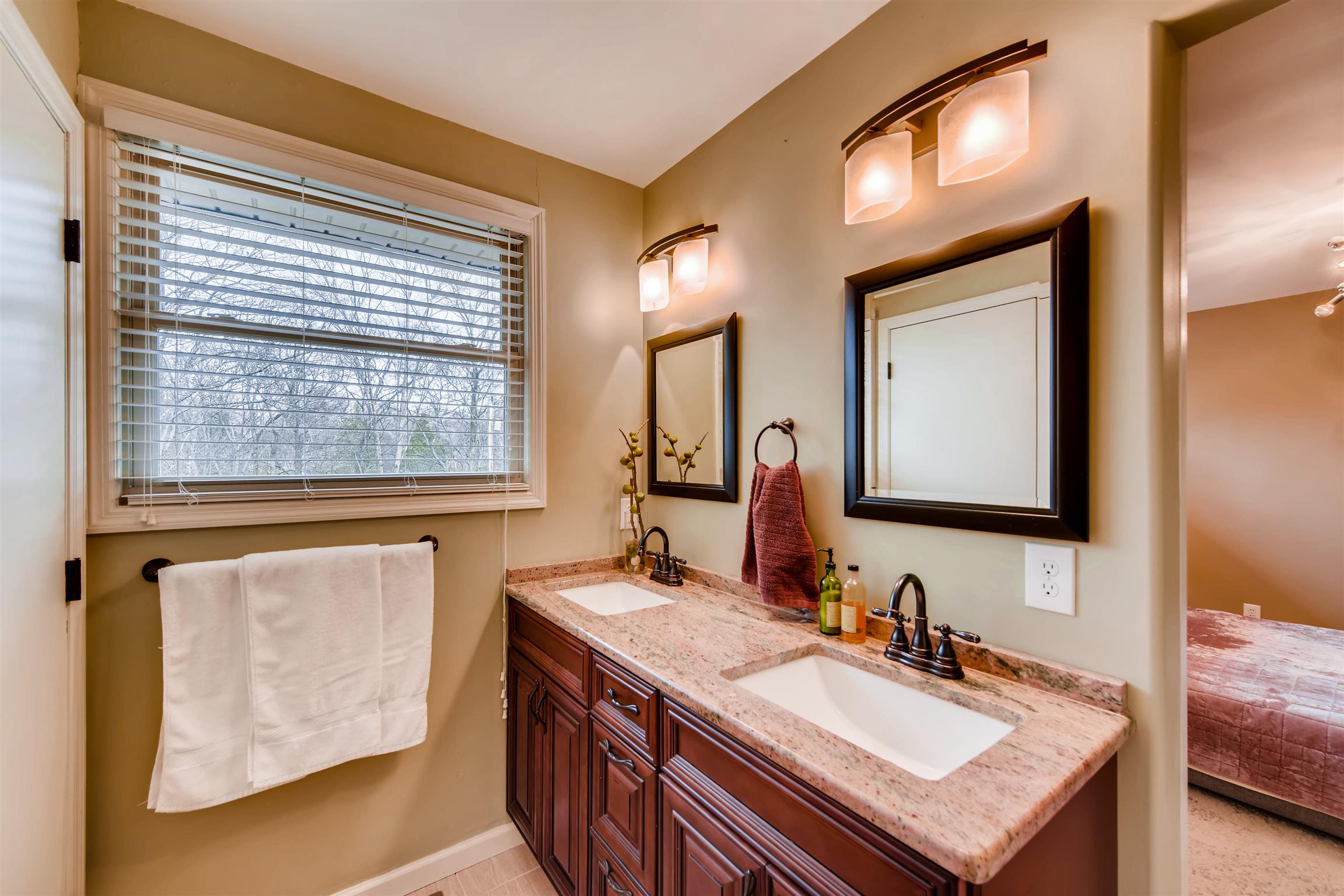 1100 Sparta Road Nashville, TN 37205 - Photo 19 of 29 a bathroom with a sink and a mirror