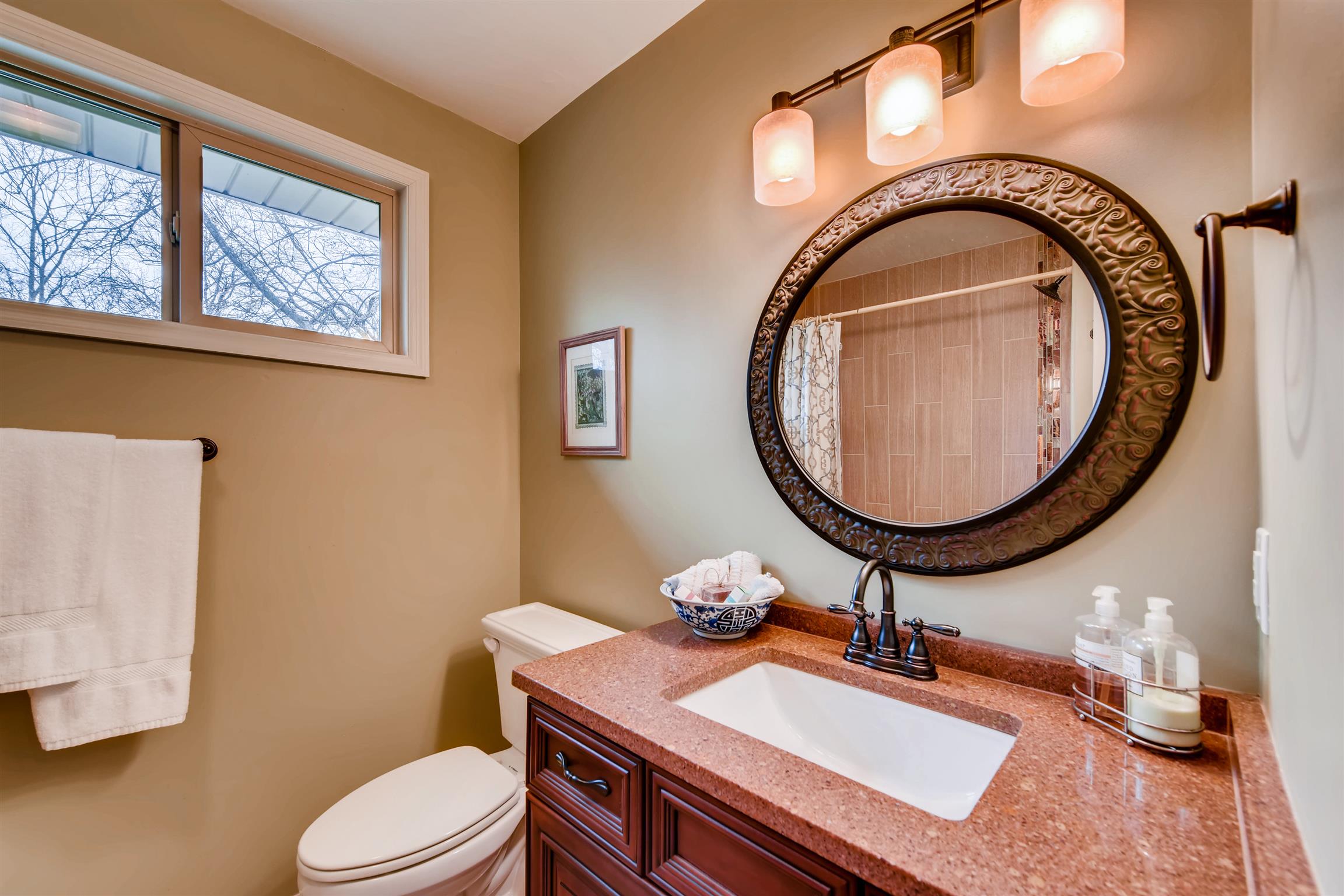 1100 Sparta Road Nashville, TN 37205 - Photo 23 of 29 a bathroom with a toilet a sink and a mirror