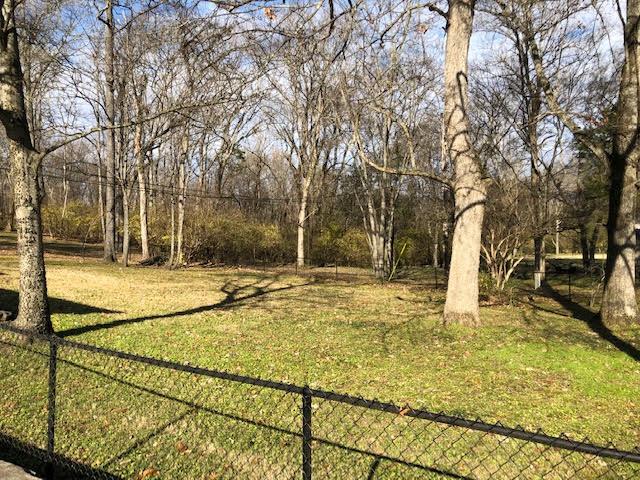 1100 Sparta Road Nashville, TN 37205 - Photo 6 of 29 a swimming pool with trees in the background