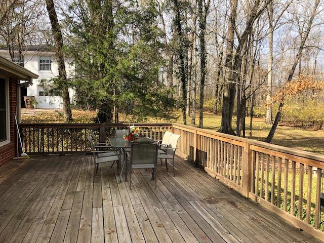 1100 Sparta Road Nashville, TN 37205 - Photo 7 of 29 a view of a chairs and table on the wooden floor