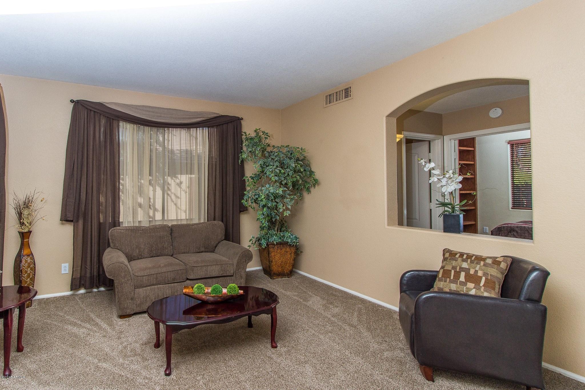 3864 East Baranca Road Gilbert, AZ 85297 - Photo 9 of 35 010_LIVING ROOM