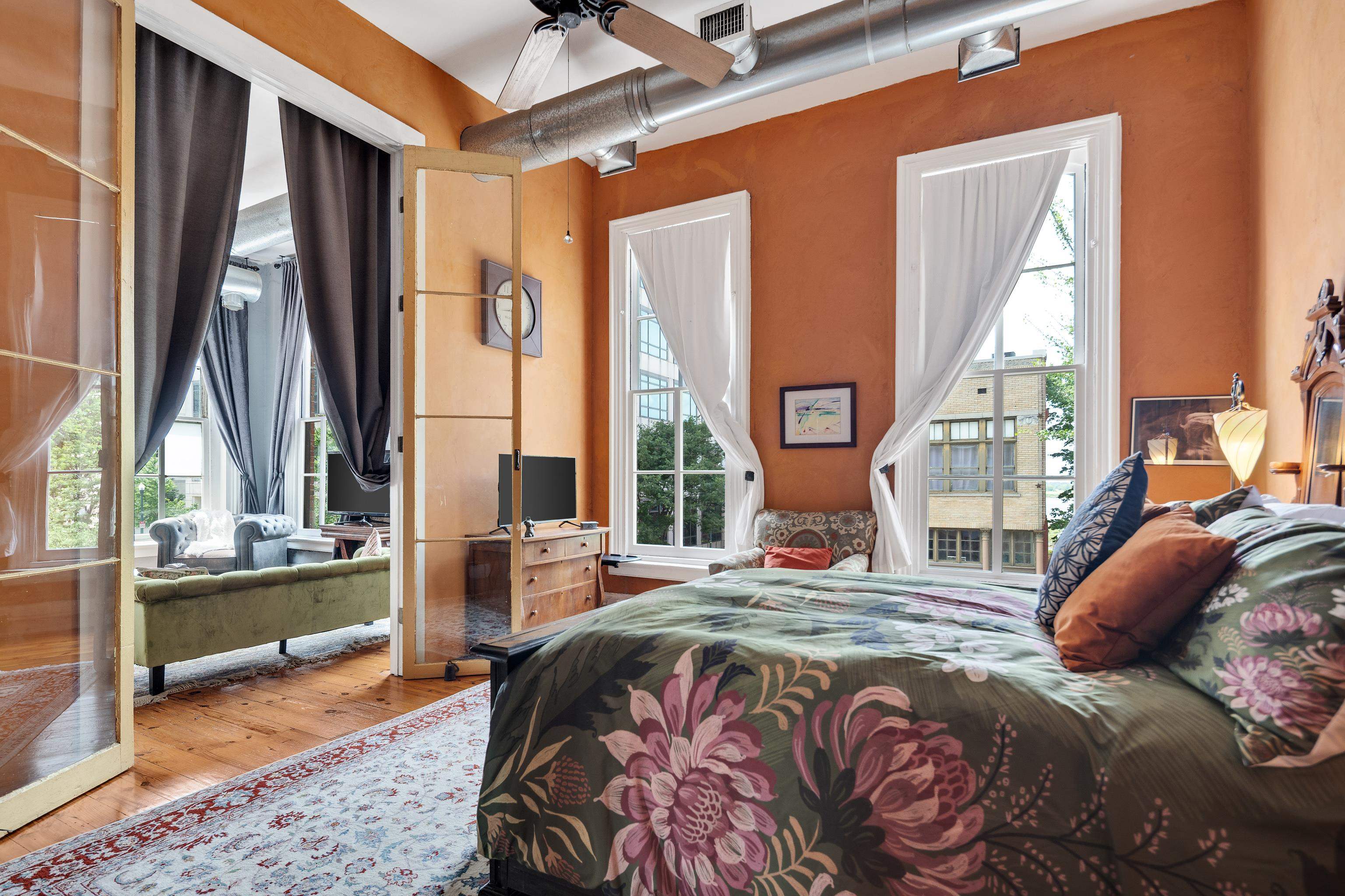 116 South Front Street, Unit 201 Memphis, TN 38103 - Photo 12 of 26 Bedroom featuring hardwood / wood-style flooring