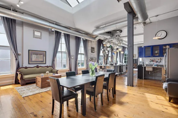 a view of a dining room with furniture