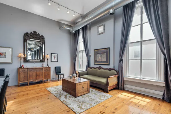 a living room with furniture and a window