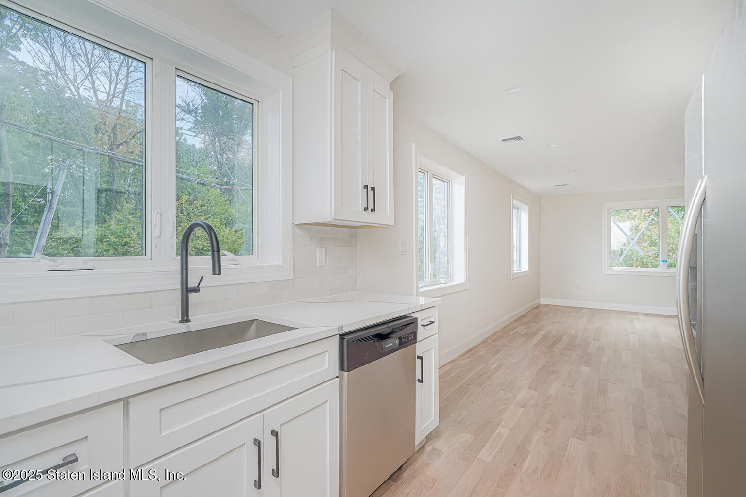 674 Arden Avenue Staten Island, NY 10312 - Photo 11 of 39 11 - Kitchen + Dining + Living