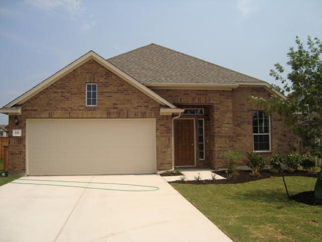 a front view of house with yard