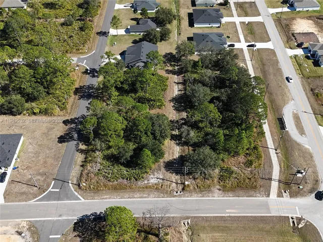 an aerial view of a residential houses