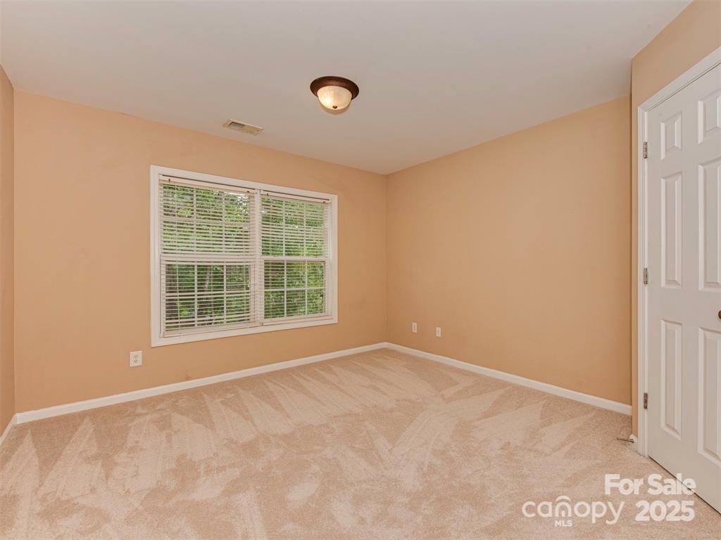 5607 Fulton Ridge Drive Indian Trail, NC 28079 - Photo 21 of 45 a view of an empty room with a window