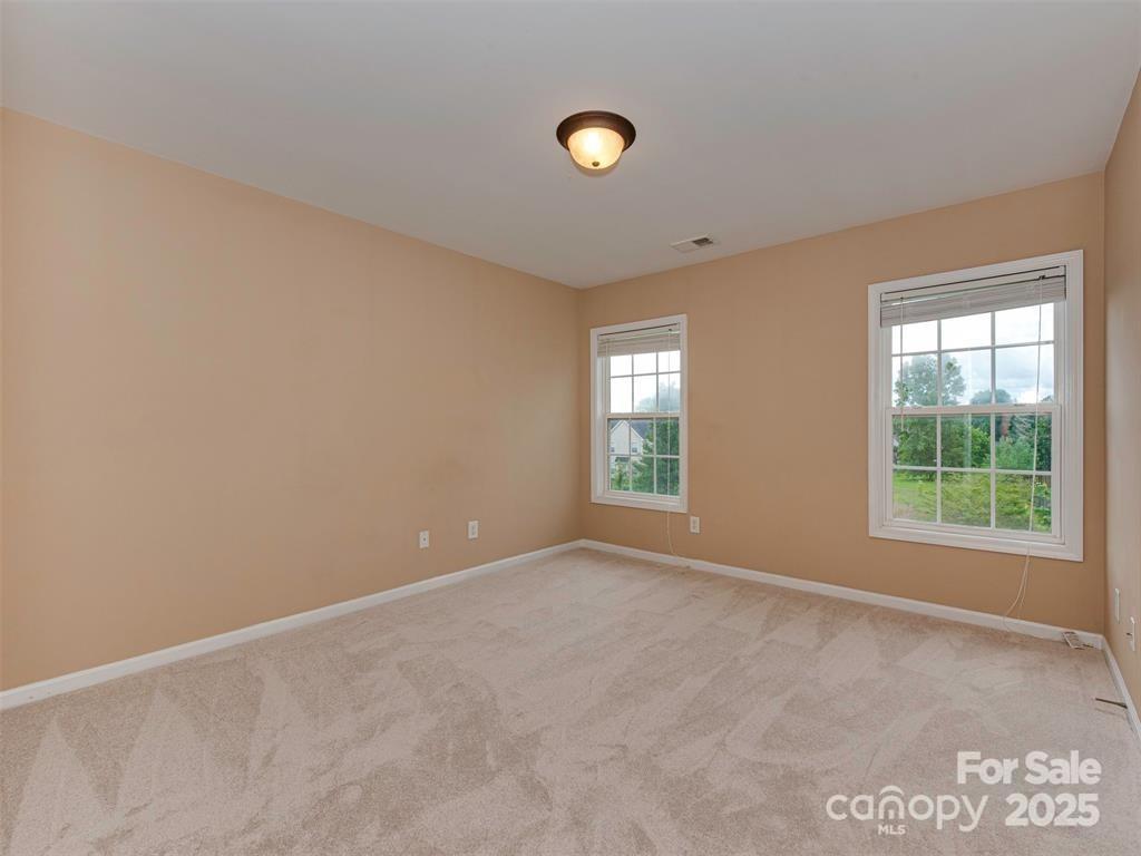 5607 Fulton Ridge Drive Indian Trail, NC 28079 - Photo 24 of 45 a view of an empty room with a window