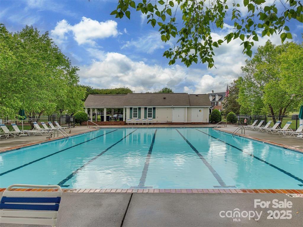5607 Fulton Ridge Drive Indian Trail, NC 28079 - Photo 43 of 45 a view of a house with a yard