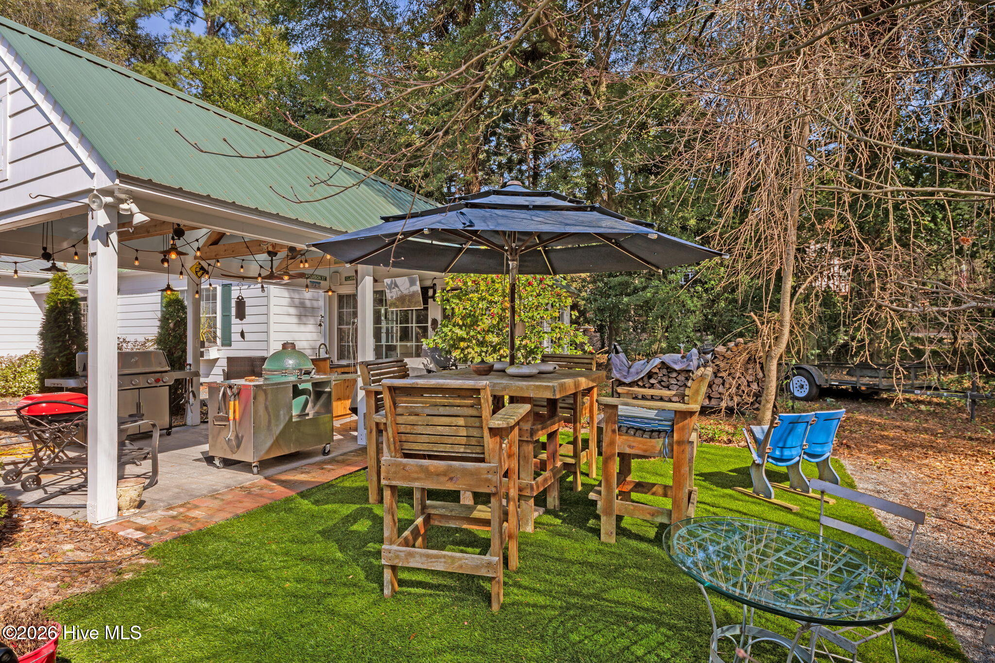 55 Linden Road Pinehurst, NC 28374 - Photo 49 of 68 Outdoor Kitchen area with turf