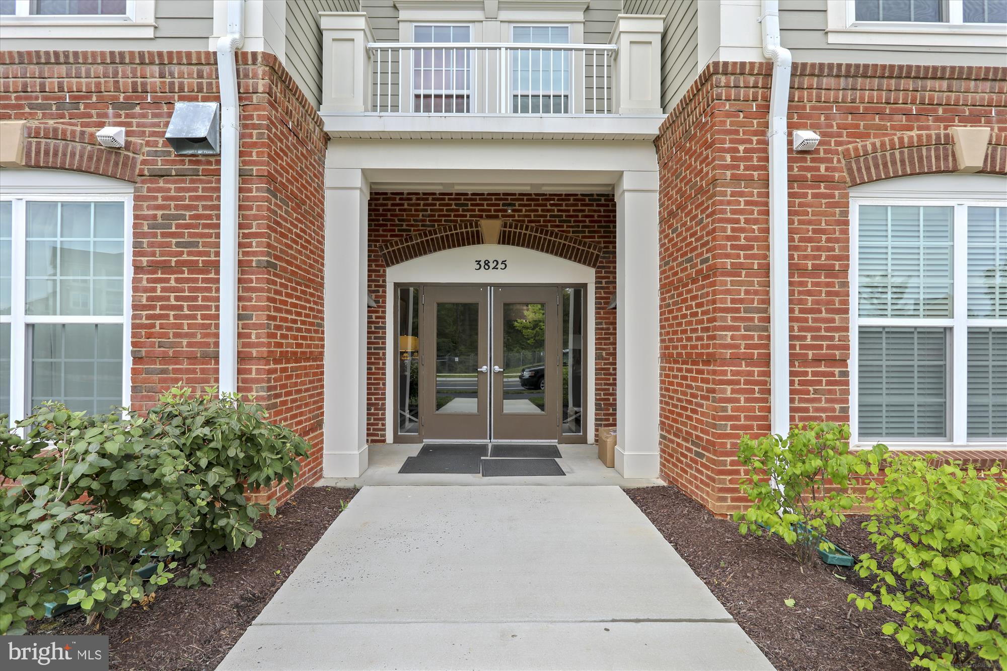 3825 Doc Berlin Drive, Unit 26 Silver Spring, MD 20906 - Photo 37 of 43 a front view of a house with a porch