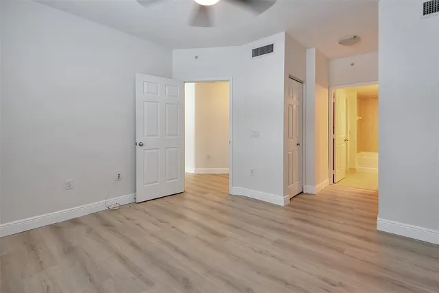 a view of an empty walk in closet