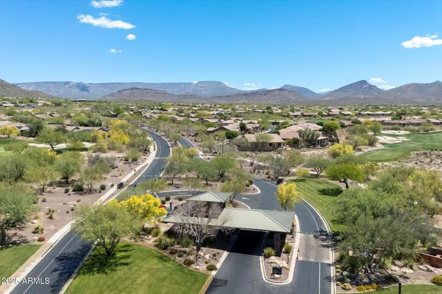 a view of a city with mountains in the background