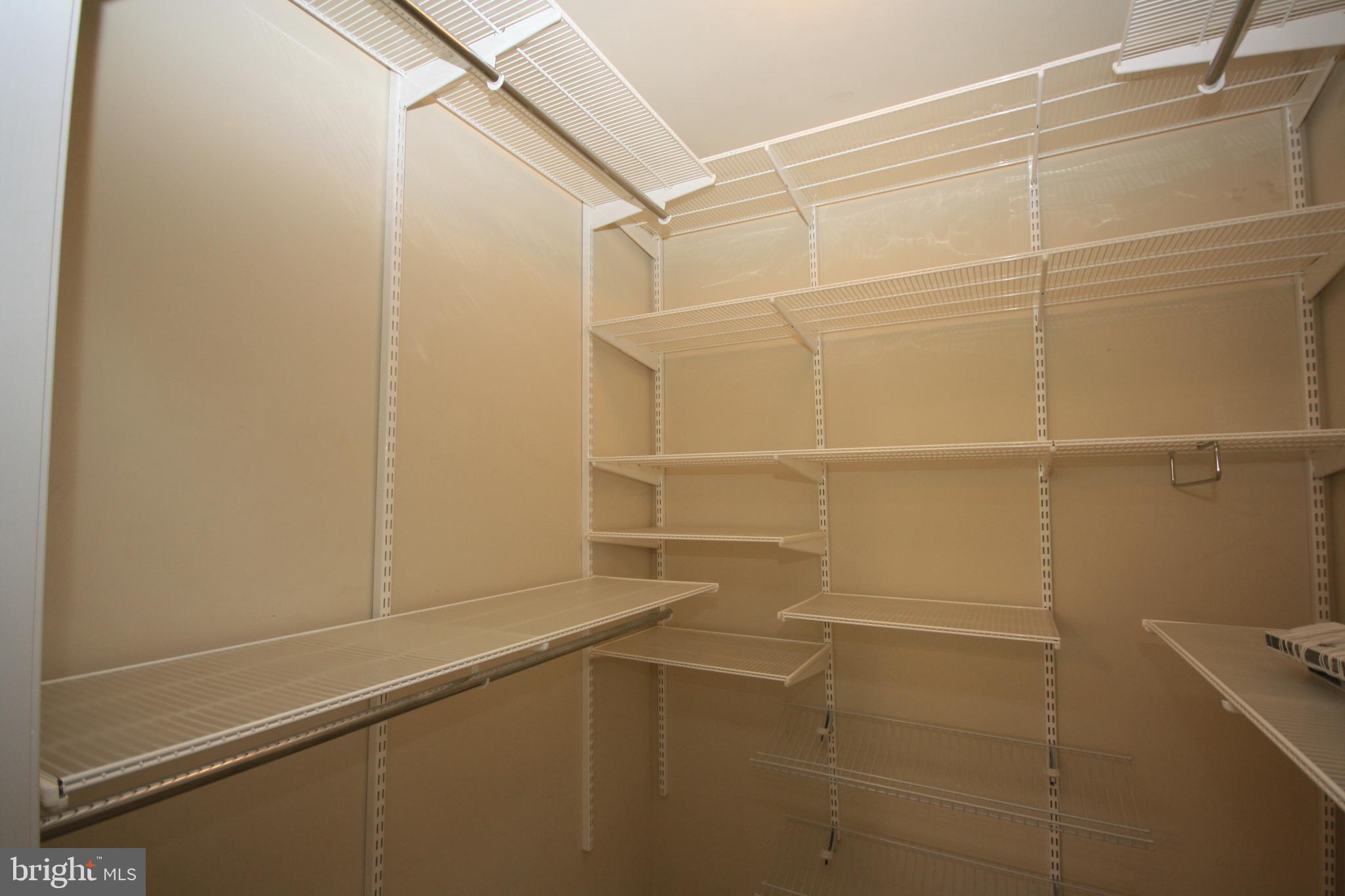 22691 Blue Elder Terrace, Unit 204 Brambleton, VA 20148 - Photo 16 of 45 a bathroom with a bathtub
