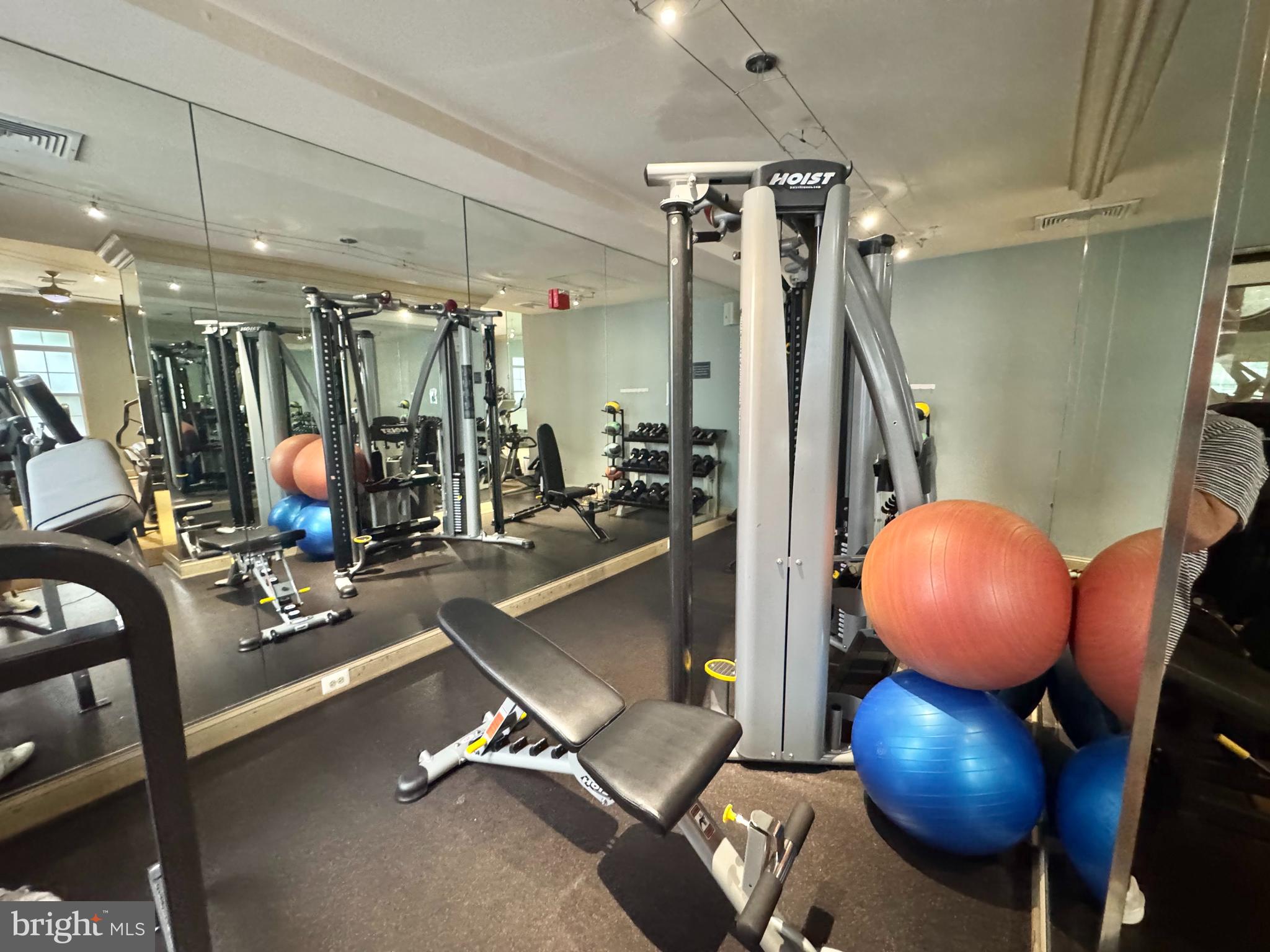 22691 Blue Elder Terrace, Unit 204 Brambleton, VA 20148 - Photo 36 of 45 a view of a room with gym equipment