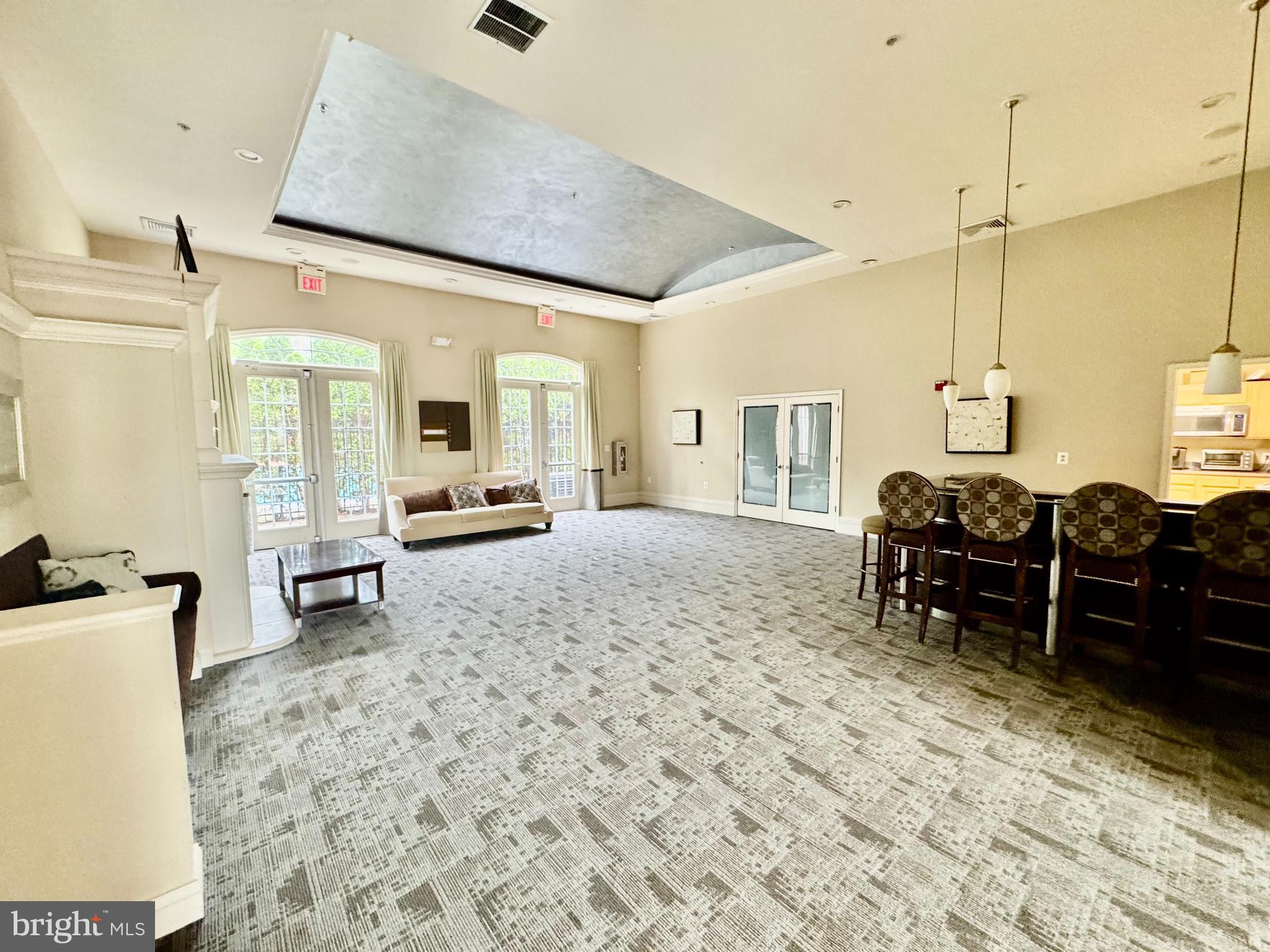 22691 Blue Elder Terrace, Unit 204 Brambleton, VA 20148 - Photo 39 of 45 a living room with furniture