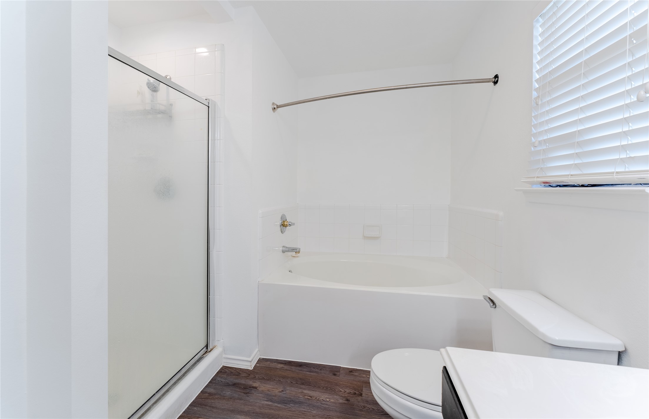 9203 Appin Court Houston, TX 77095 - Photo 19 of 38 a bathroom with a toilet and a shower