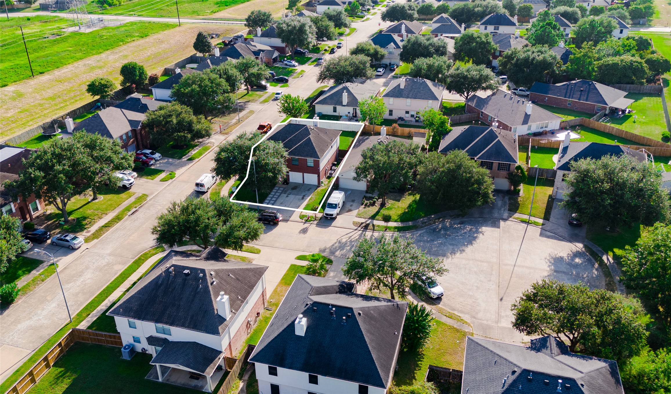 9203 Appin Court Houston, TX 77095 - Photo 33 of 38 an aerial view of multiple houses with yard