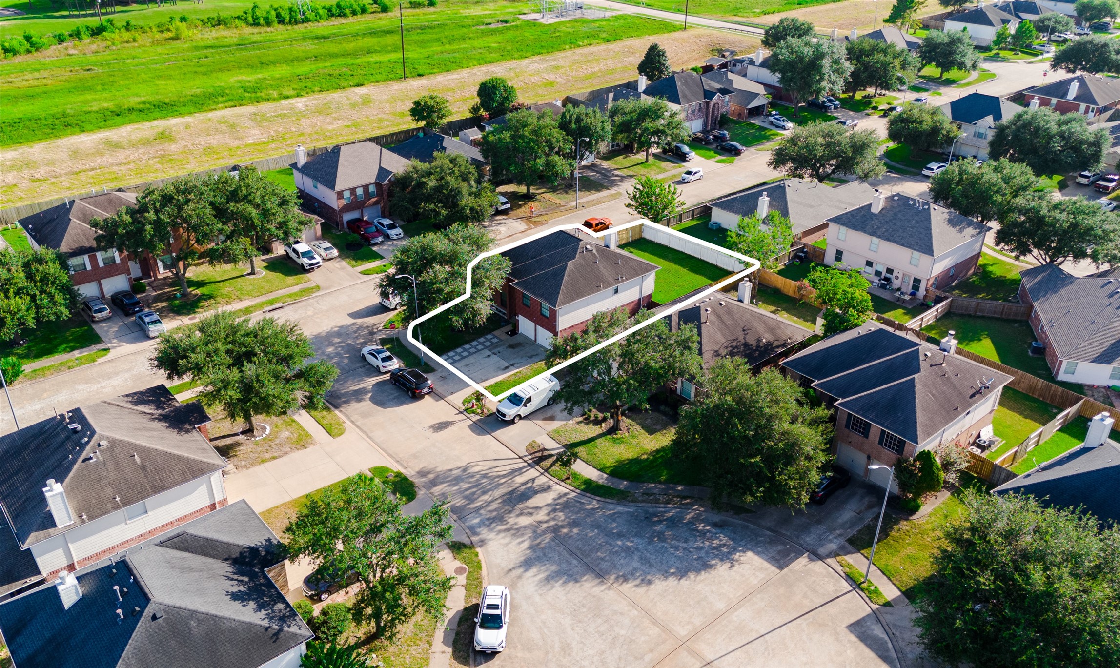9203 Appin Court Houston, TX 77095 - Photo 34 of 38 an aerial view of residential houses with outdoor space and street view