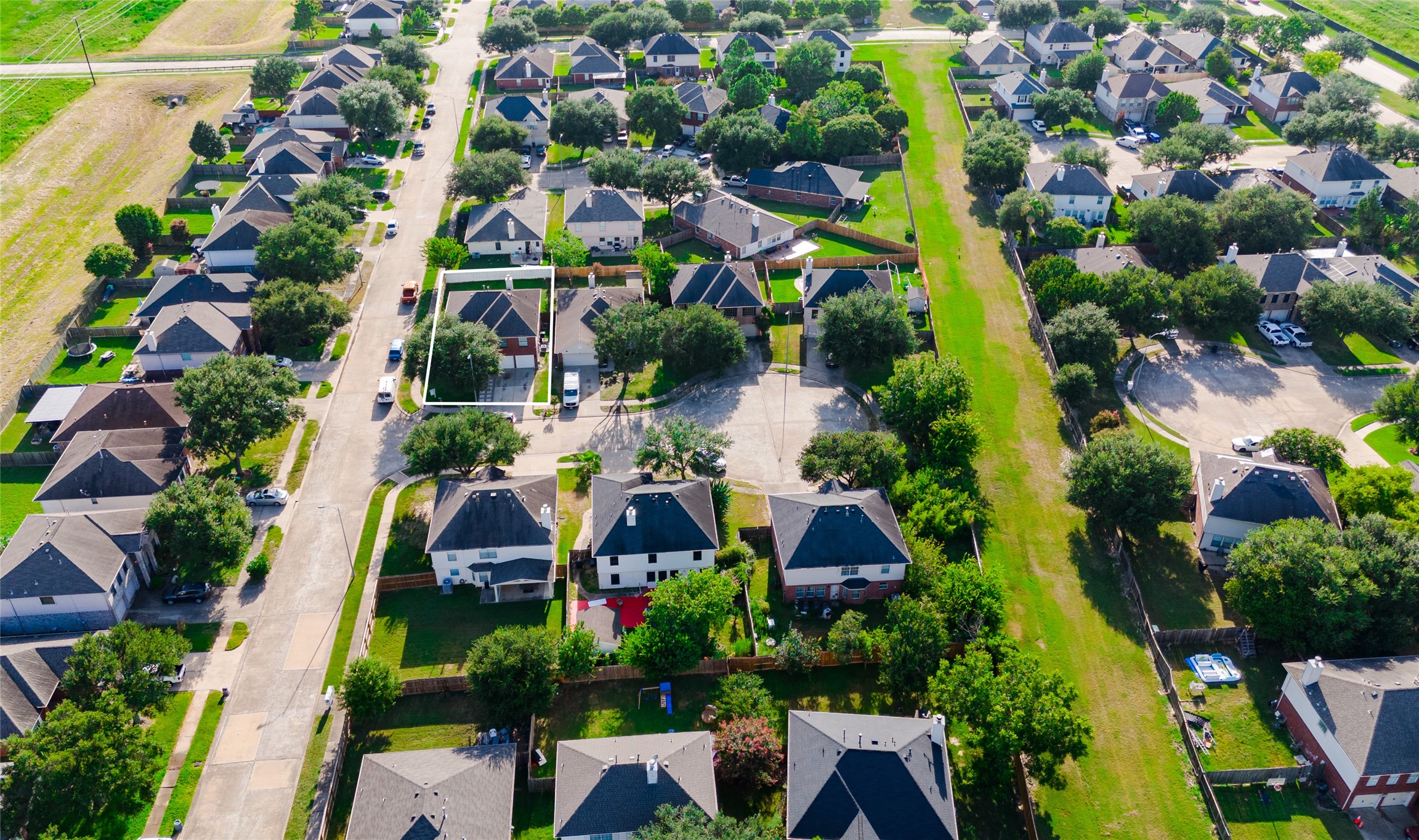9203 Appin Court Houston, TX 77095 - Photo 35 of 38 an aerial view of residential houses with outdoor space and street view