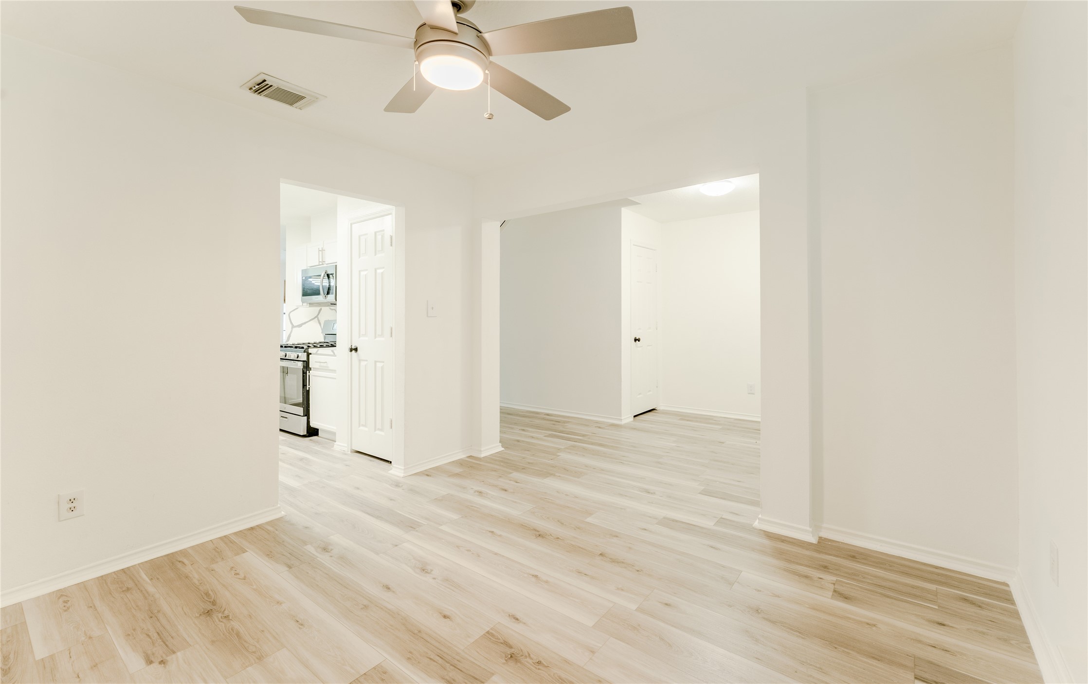 9203 Appin Court Houston, TX 77095 - Photo 4 of 38 wooden floor in an empty room