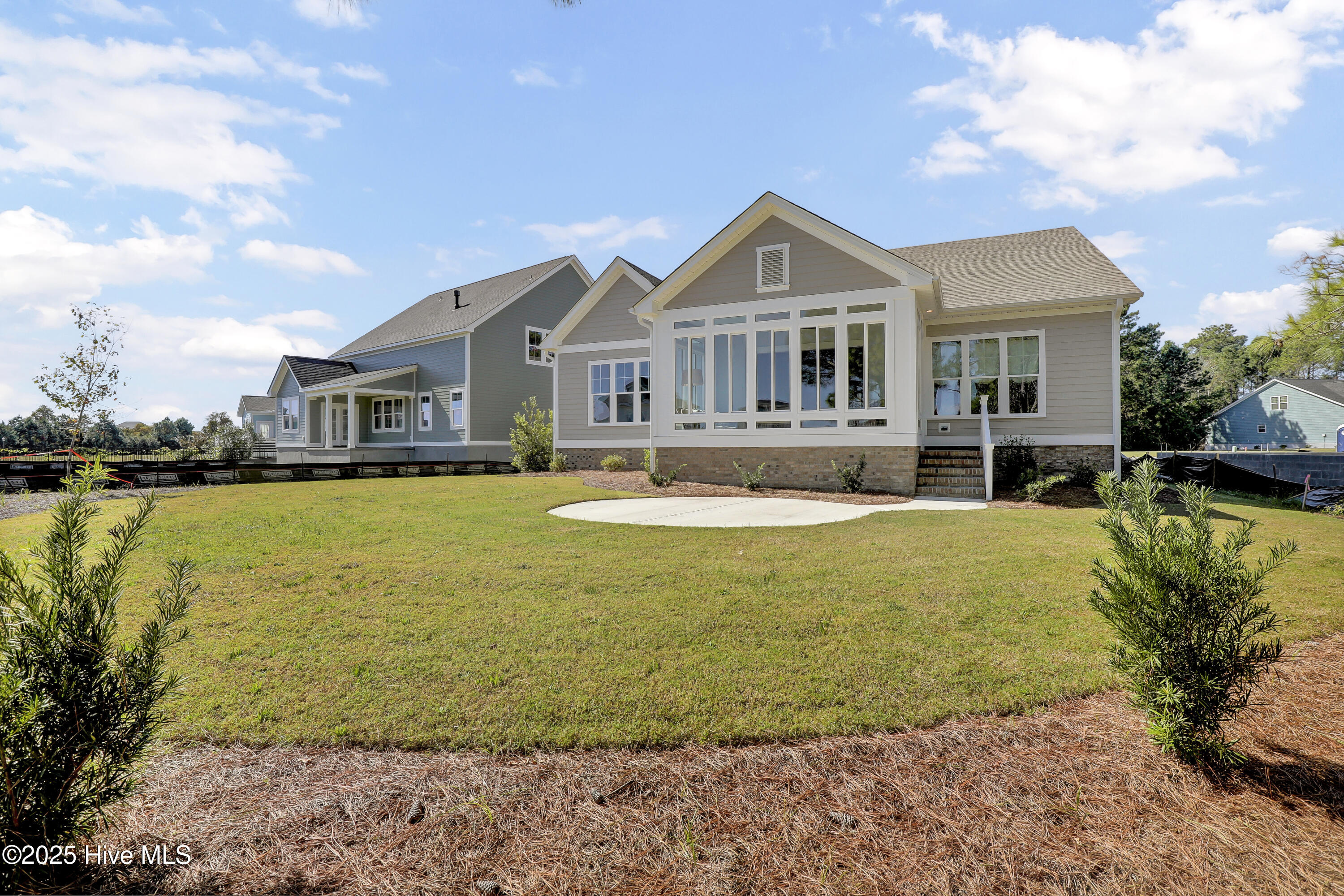 813 Sweetgrass Street Holly Ridge, NC 28445 - Photo 2 of 87 Come sit in this Four seasons room.