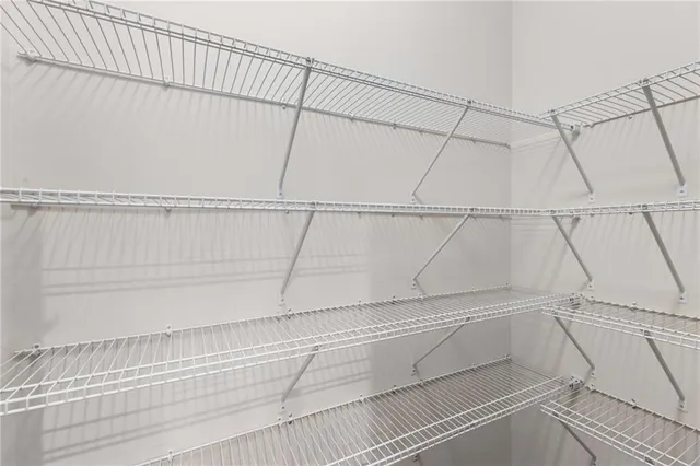 a view of a room with racks on the wall