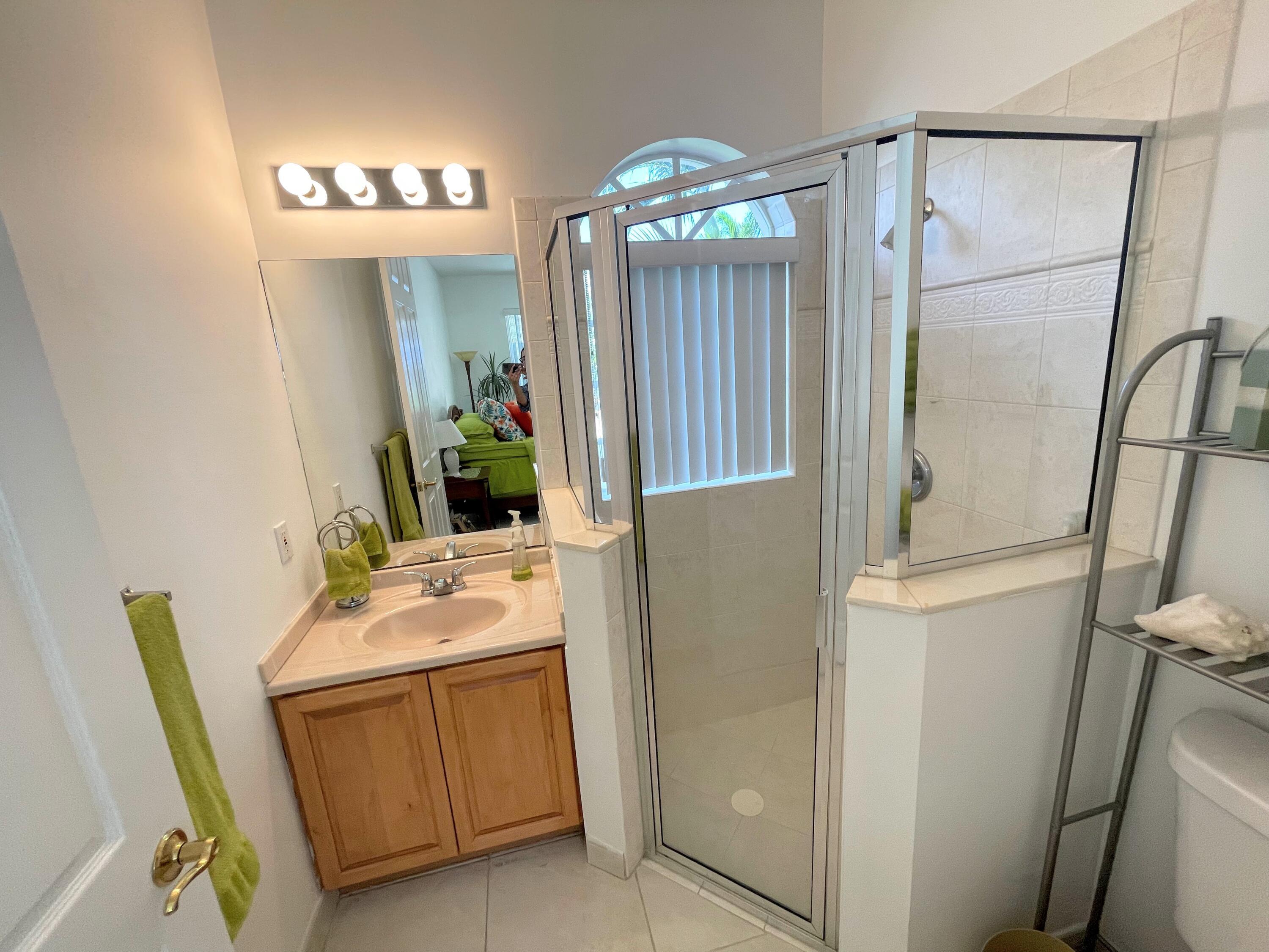 7060 Northwest Turtle Walk Boca Raton, FL 33487 - Photo 50 of 51 Courtyard House bathroom